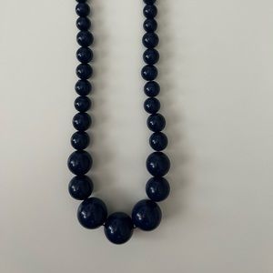 Navy blue plastic pearl necklace